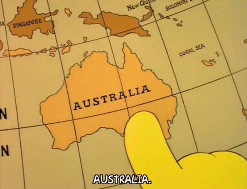 A character from The Simpsons (Lisa?) points a yellow finger at Australia on a globe.