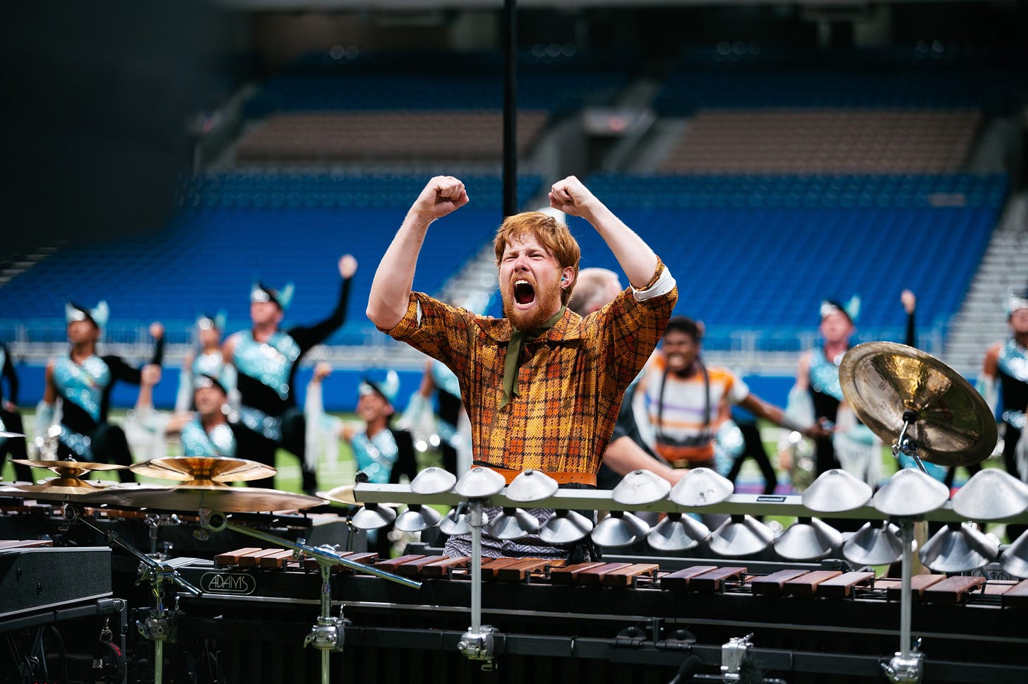 May be an image of 9 people and cymbal