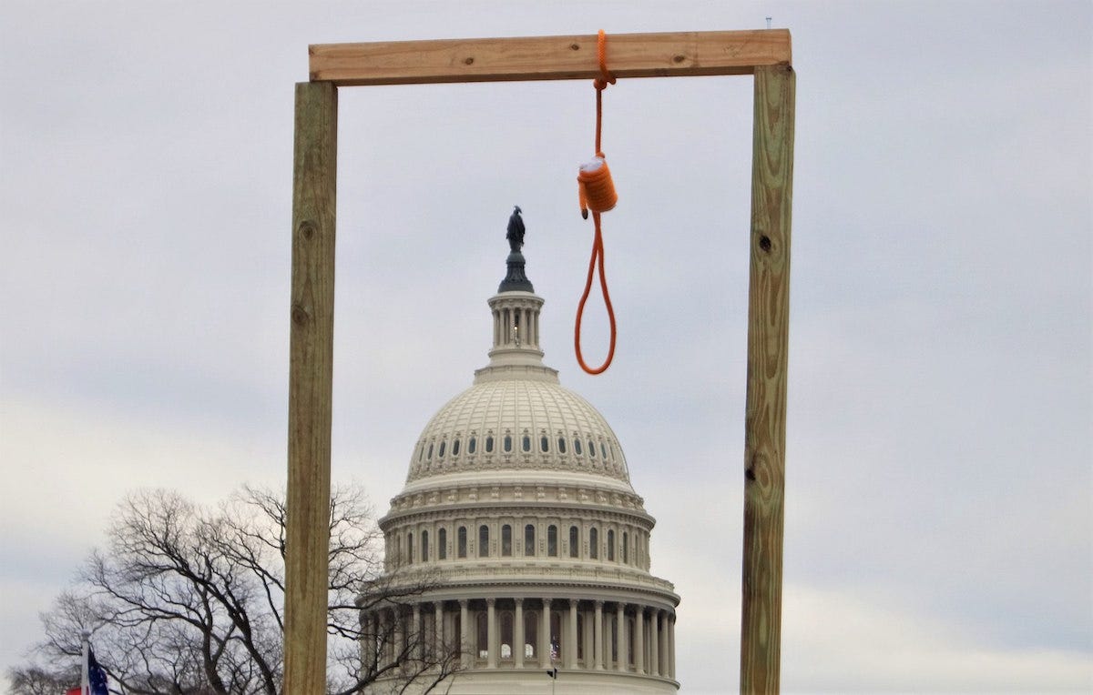 A gallows hangs near the United States Capitol during the January 6, 2021 Trump insurrection. (Tyler Merbler from USA/Creative Commons BY 2.0)