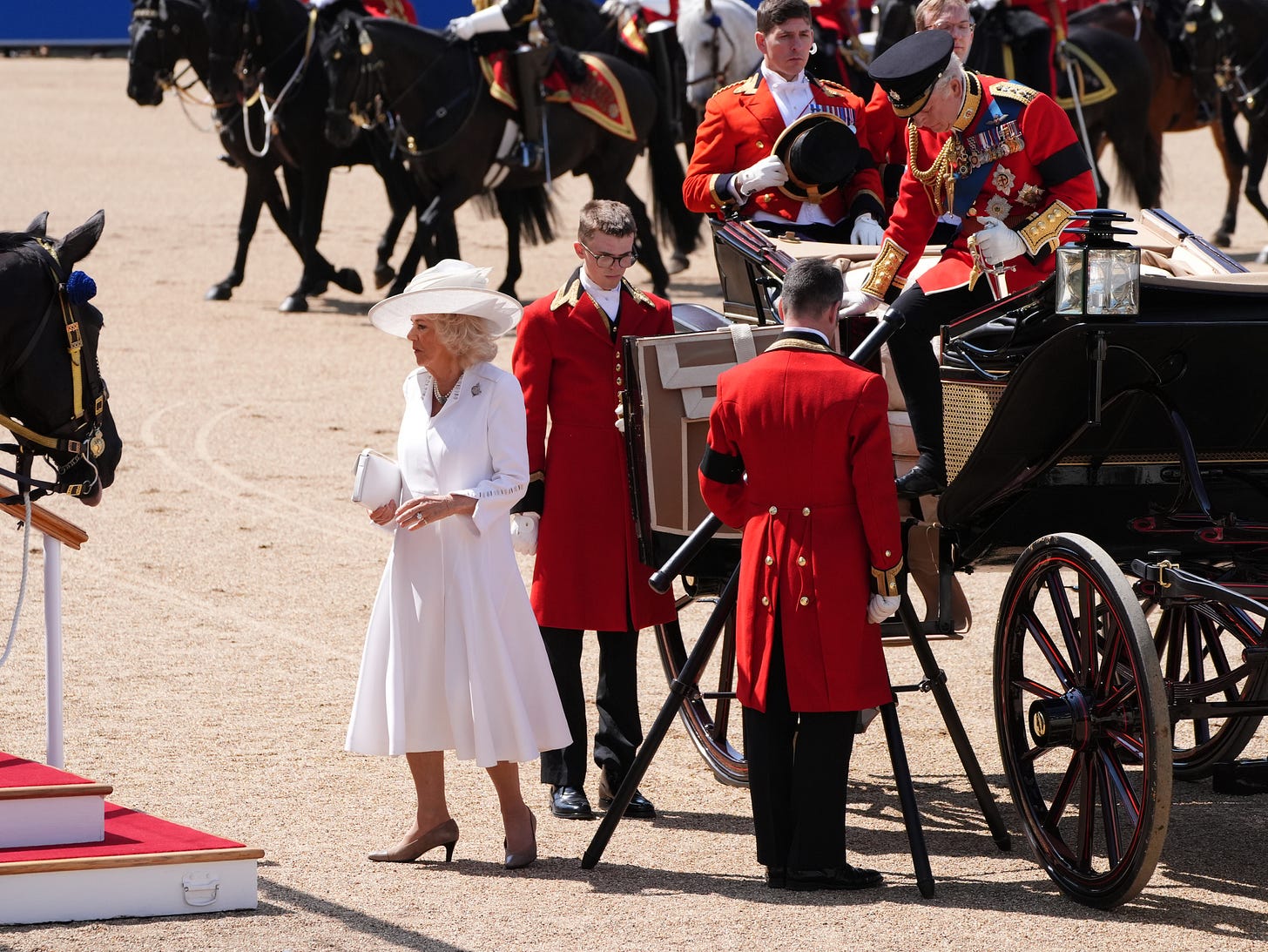 Queen Camilla stepping out of carriage at Horse Guards Parade