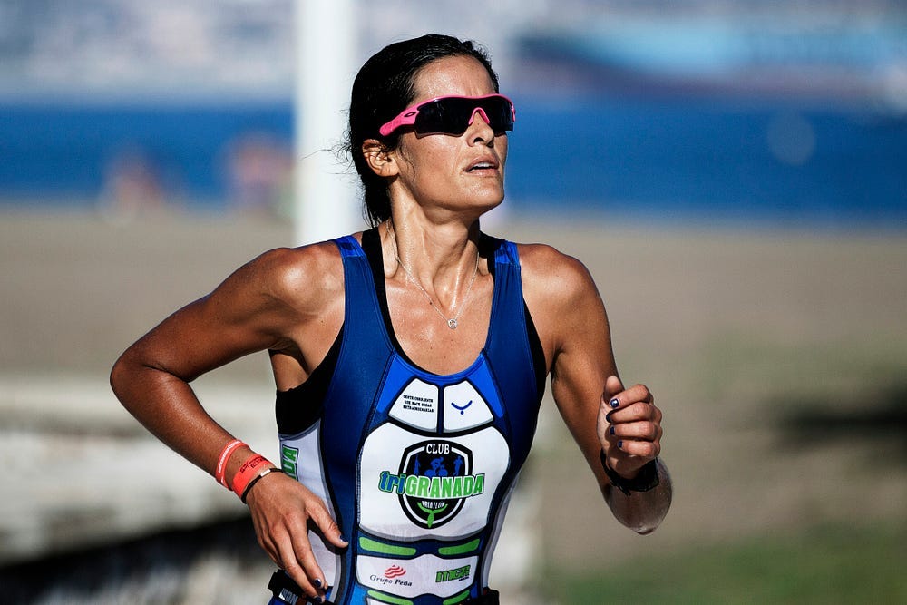 Runner running on the racetrack.