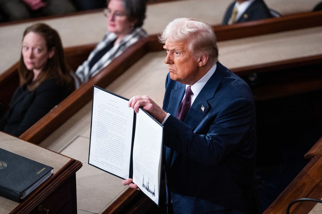 UNITED STATES - MARCH 4: President Donald Trump holds and executive order to rename a Texas wildlife sanctuary to honor Jocelyn Nungaray, during an address to a joint session of Congress in the U.S. Capitol on Tuesday, March 4, 2025.The 12-year-old was killed in Houston by illegal migrants in 2024.(Tom Williams/CQ-Roll Call, Inc via Getty Images)
