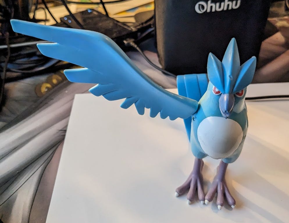 Faeore's most prized possession is an Articuno figure, given to her by her best friend. Somewhere in the transition of moving many times, she has lost one of his wings, and he's got a bit chipped. We at Johto Times hope that someday, Articuno will soar once more!