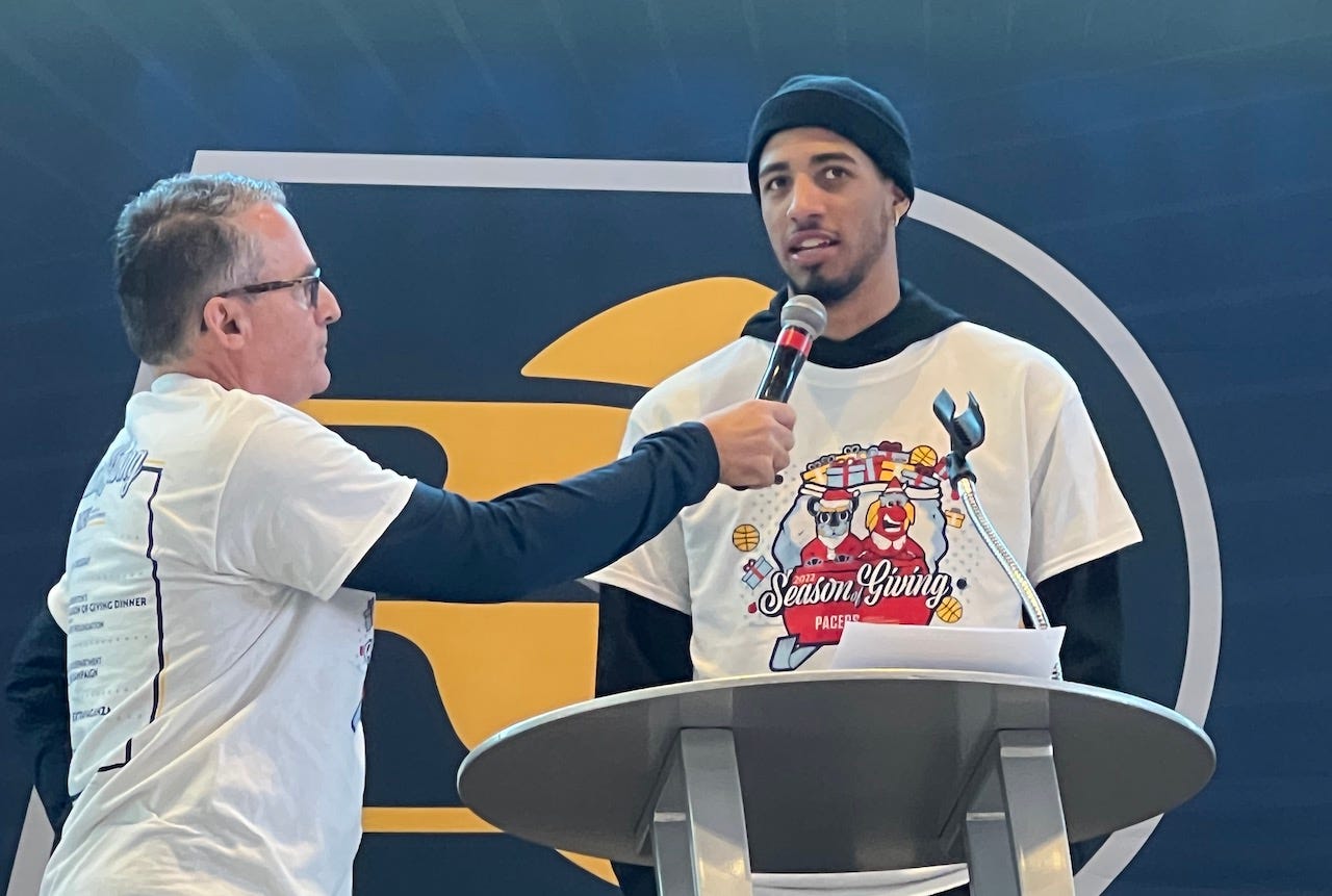 Chris Denari, the TV voice of the Pacers, interviews Tyrese Haliburton during their annual Thanksgiving celebration.