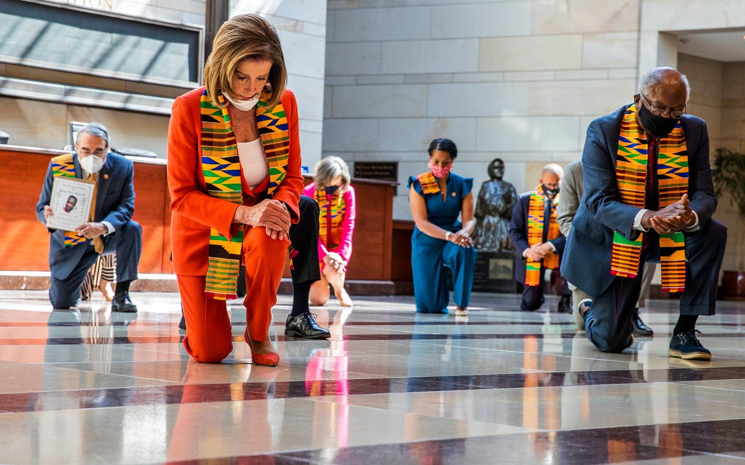 Democrats face backlash after wearing Kente cloth while kneeling for George  Floyd