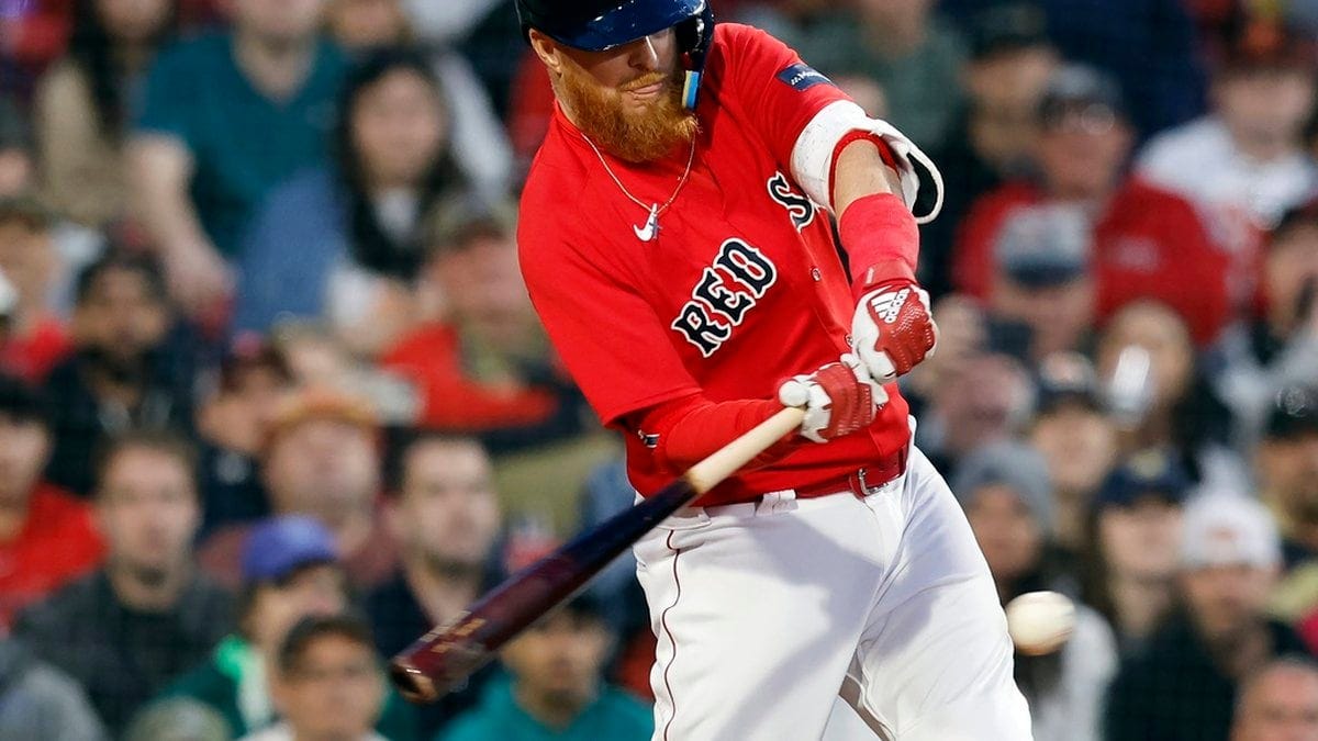 Boston Red Sox's Justin Turner plays against the Baltimore Orioles during the ninth inning of a...