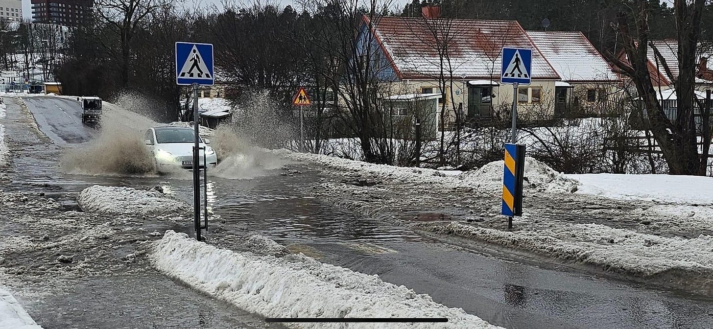 Flooded roads and melted snow