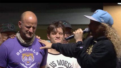 Sean Feucht, right, prays over Republican strategist Timothy Teepell, left, and his family in West Palm Beach, Florida, in February 2021. (Video screen grab)