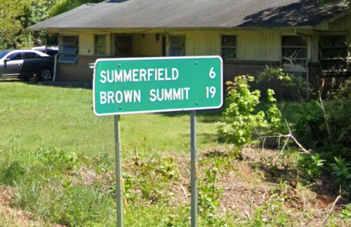 brown summit on oak ridge road sign