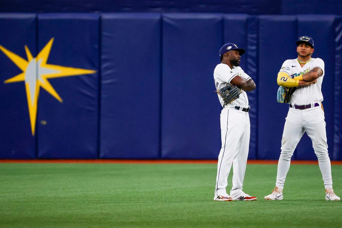 Tampa Bay Rays left fielder Randy Arozarena (56) and center fielder Jose Siri (22) pose as they celebrate defeating the the Detroit Tigers at Tropicana Field in St. Petersburg on Opening Day Thursday, March 30, 2023. 

