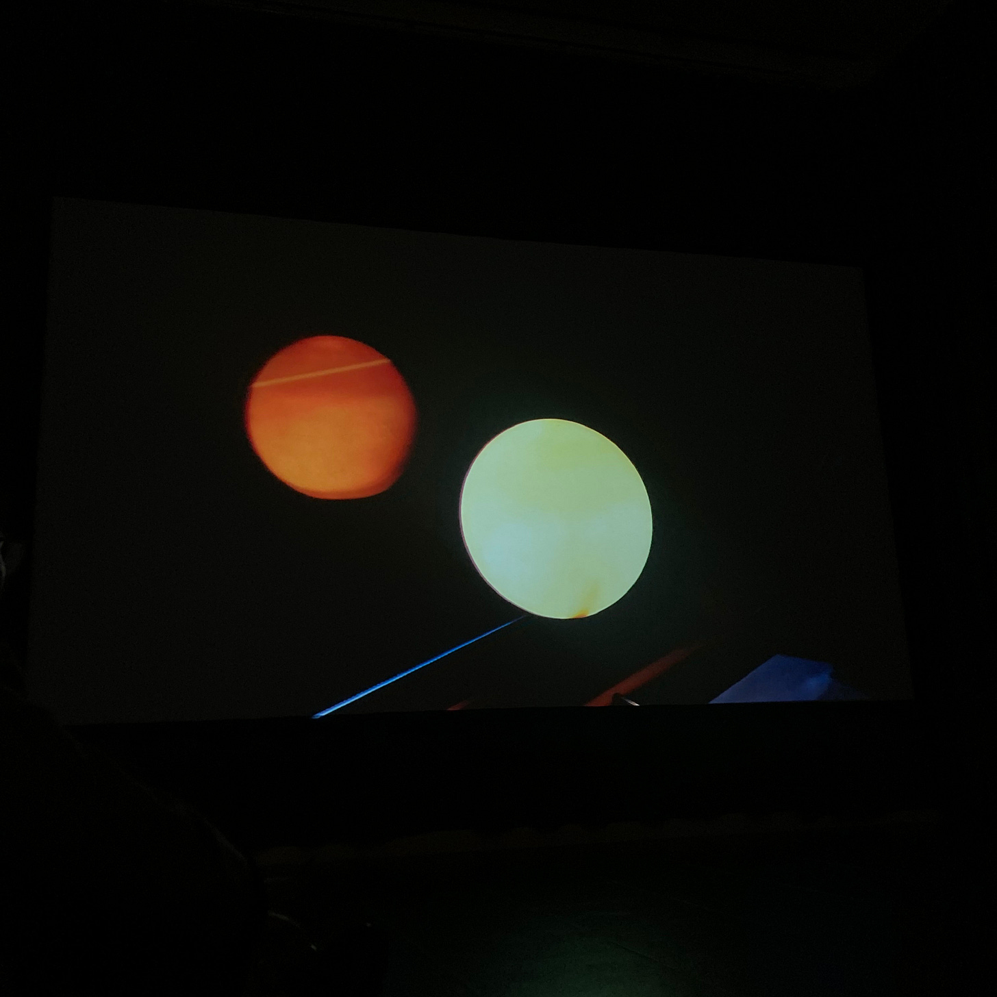 Planet-like light spheres from Wolfgang Tillmans video at Albertinum