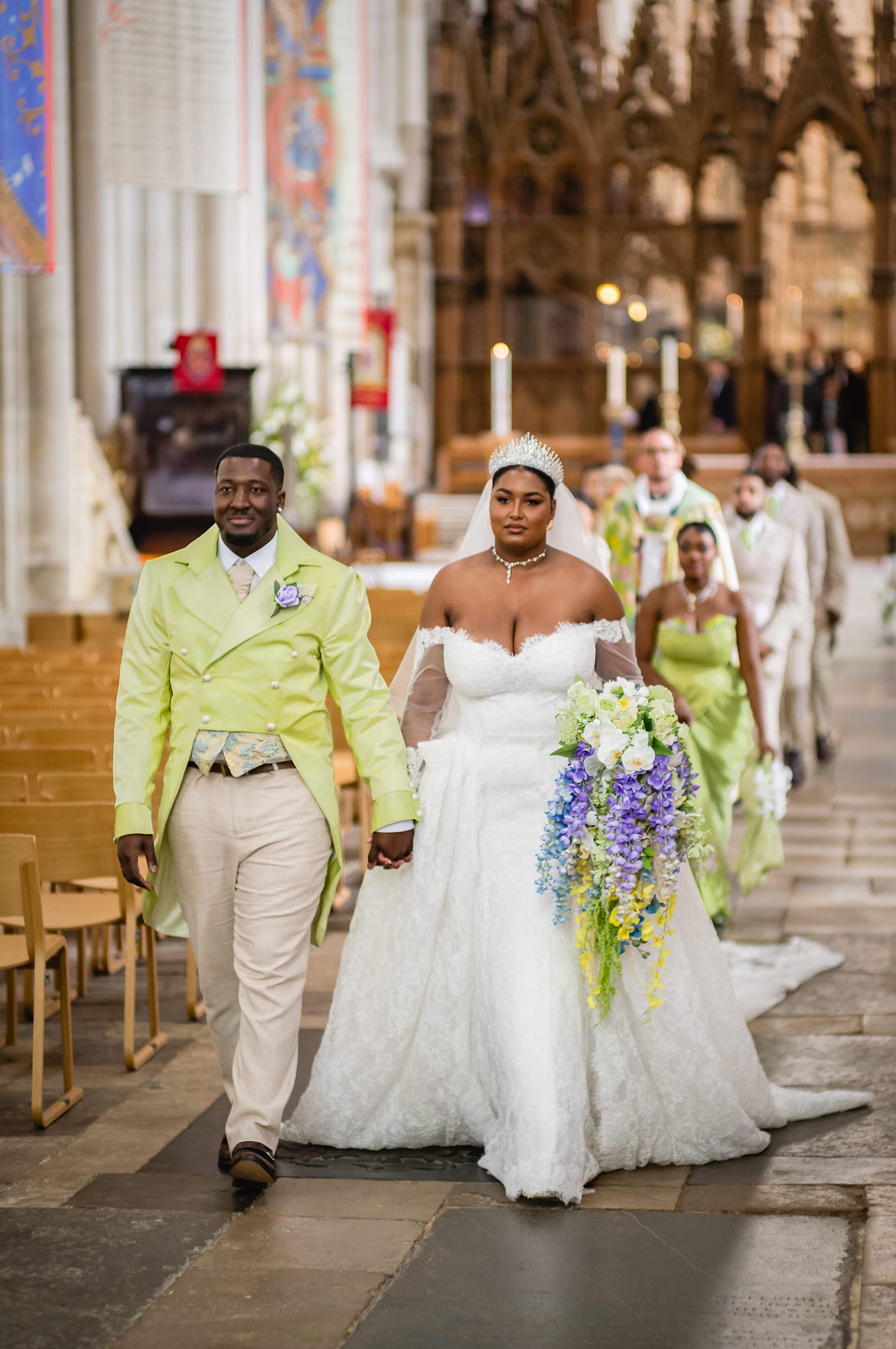 A quick photo of the happy couple walking down the aisle. 1/100, f/2.8, ISO 500, 90mm