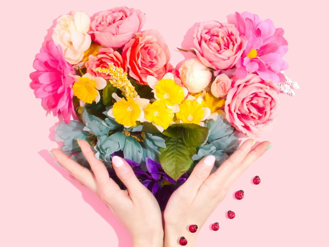 person holding bouquet of flower