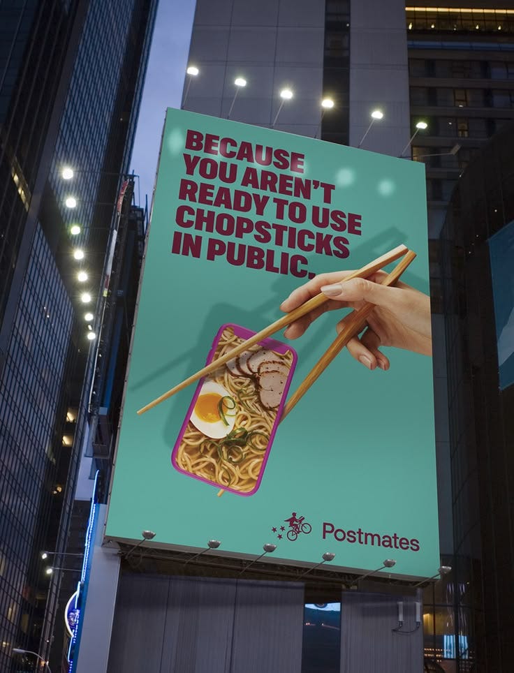 This may contain: a large advertisement sign with chopsticks in front of a building that reads because you aren't ready to use chopsticks in public