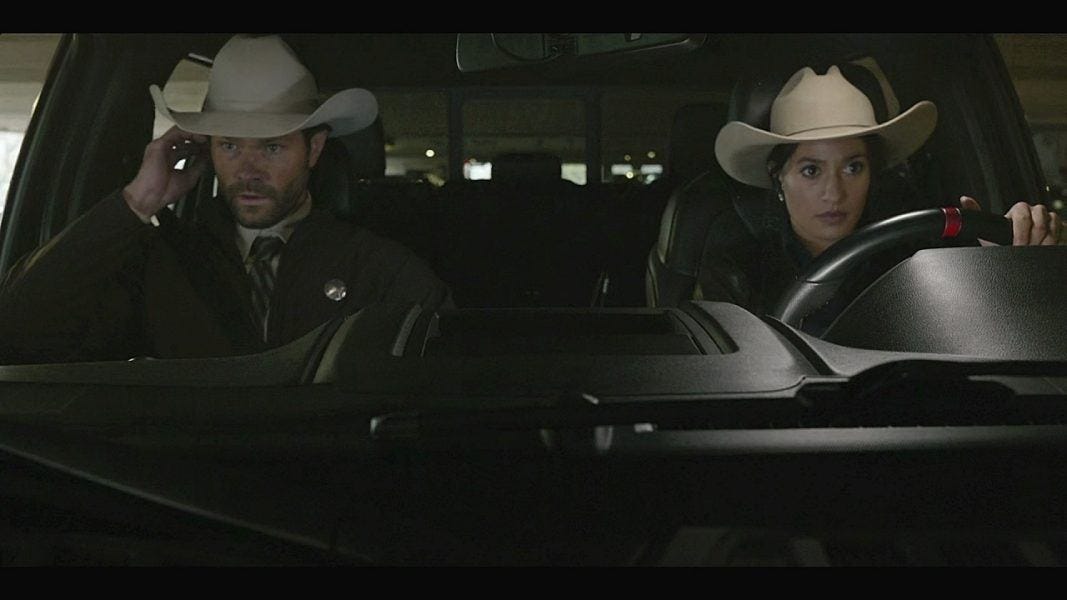 Walker Cordell with Cassie in squad car.