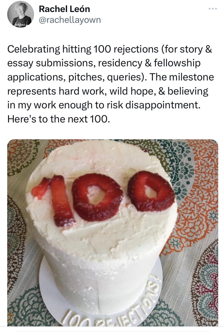 Photo of Twitter post that says, "Celebrating hitting 100 rejections (for story & essay submissions, residency & fellowship applications, pitches, queries). The milestone represents hard work, wild hope, & believing in my work enough to risk disappointment. Here's to the next 100." And a photo of a white cake with 100 spelled out with strawberries