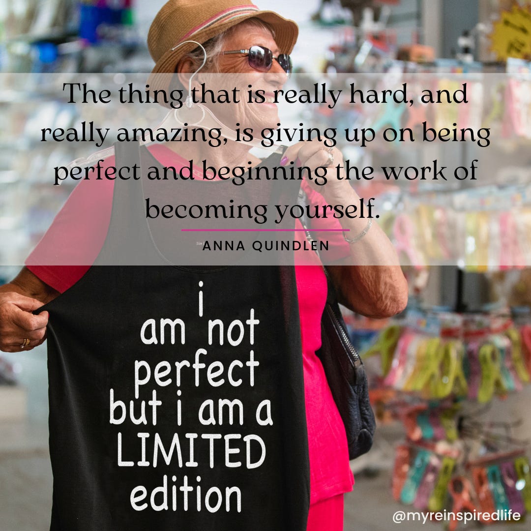 Senior woman wearing a bright pink shirt and holding up a sign that reads, I am not perfect. I am a limited edition."