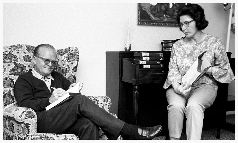 Truman Capote and Harper Lee signing copies of In Cold Blood - 1966 (photo courtesy of Steve Shapiro/Corbis)