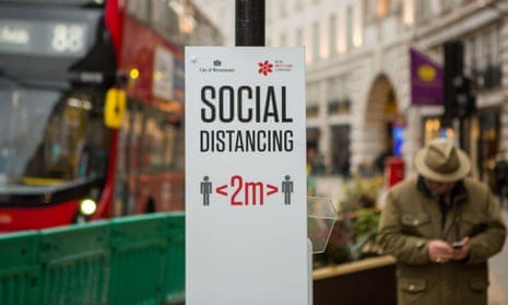 A social distancing sign in central London during the pandemic in 2020