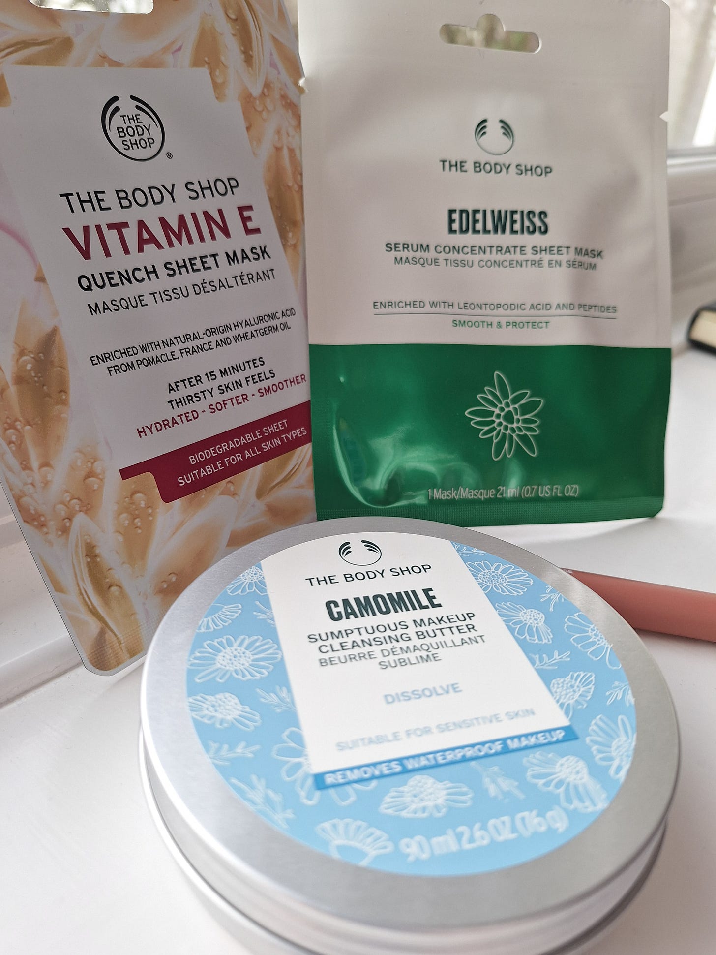 Photo of The Body Shop products - masks, claensing butter and lip pencil
