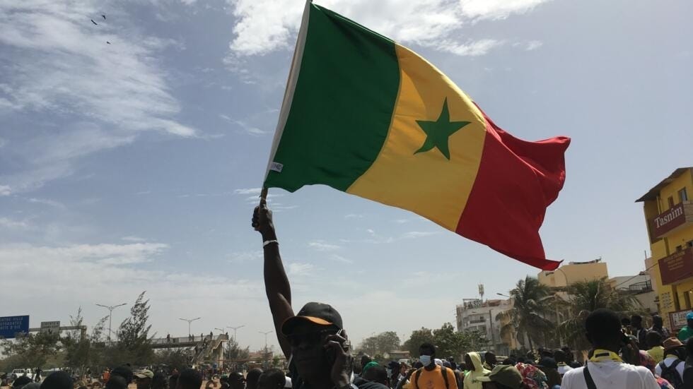 Protesters in Dakar, Senegal, demand a new election date on 24 February, 2024.