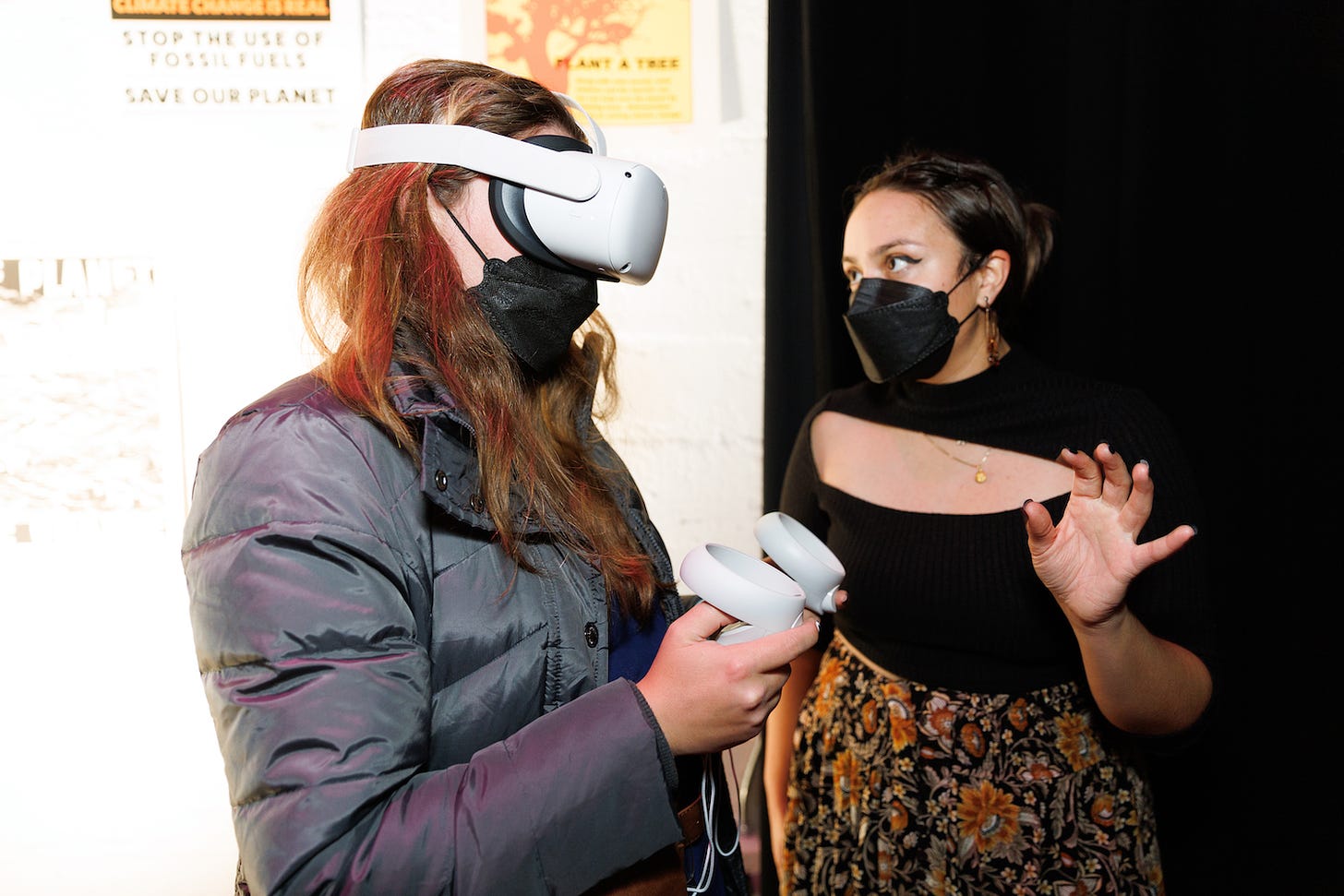 Siobhan Keegan, Climate Gallery VR Designer guided a visitor to navigate through one of the galleries using Oculus Quest 2 headset.