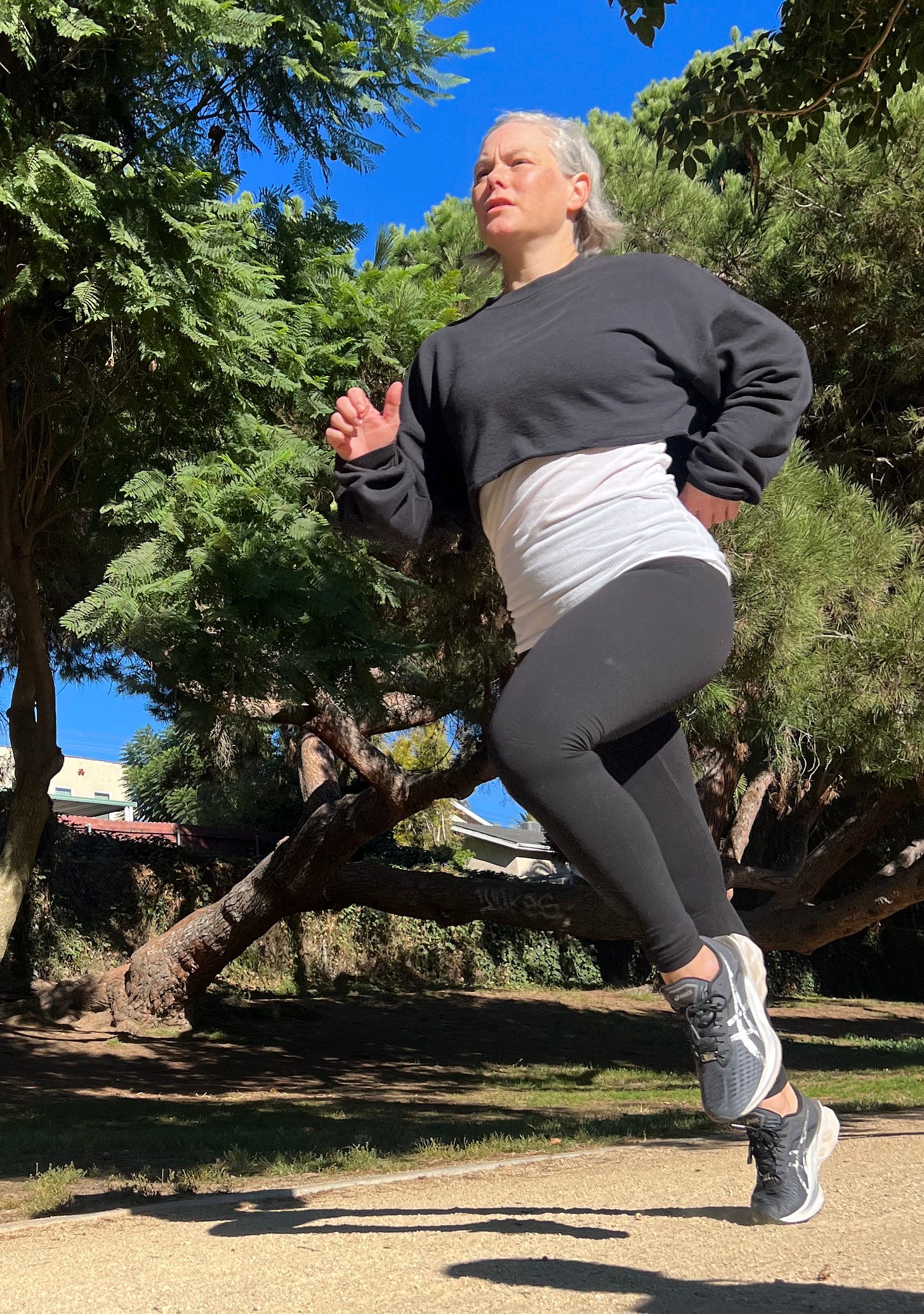 A full body photo of the author mid-stride with a concentrated look on her face.