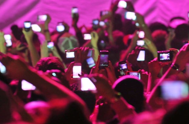 Dear Everyone Who Attends Concerts: Put Your Fucking Phones Away • Howl &  Echoes