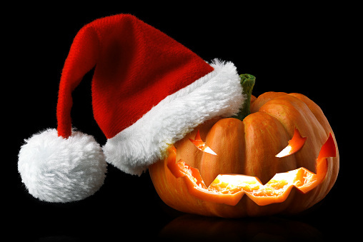 Single Orange Pumpkin Jackolantern With Christmas Santa Hat Stock Photo - Download Image Now ...