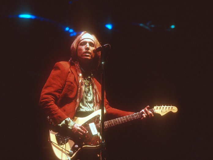 Tom Petty photographed playing live