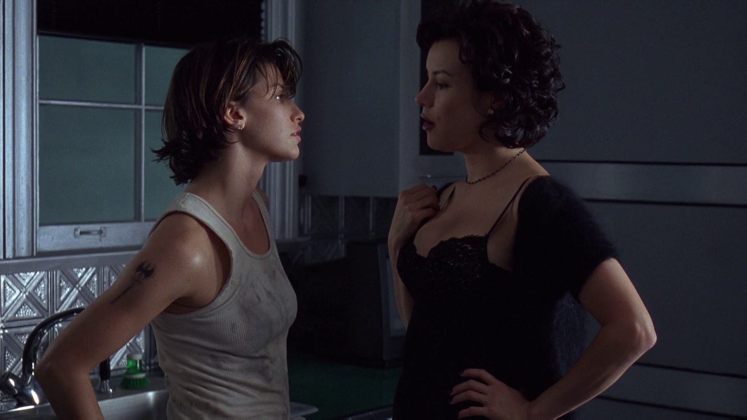 Still from Bound featuring Gina Gershon and Jennifer Tilly.