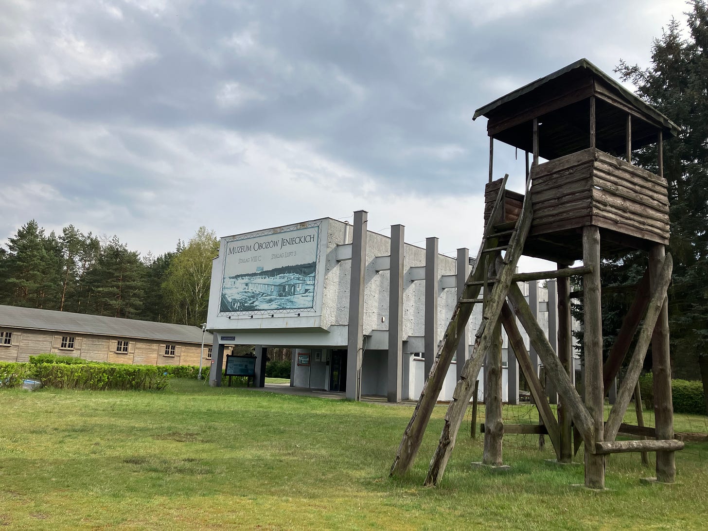 The Stalag Luft III Museum exterior with a view of replicas of parts of the camp.