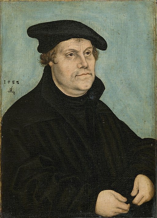 A portrait of a seated man in Renaissance attire with hands in his lap.