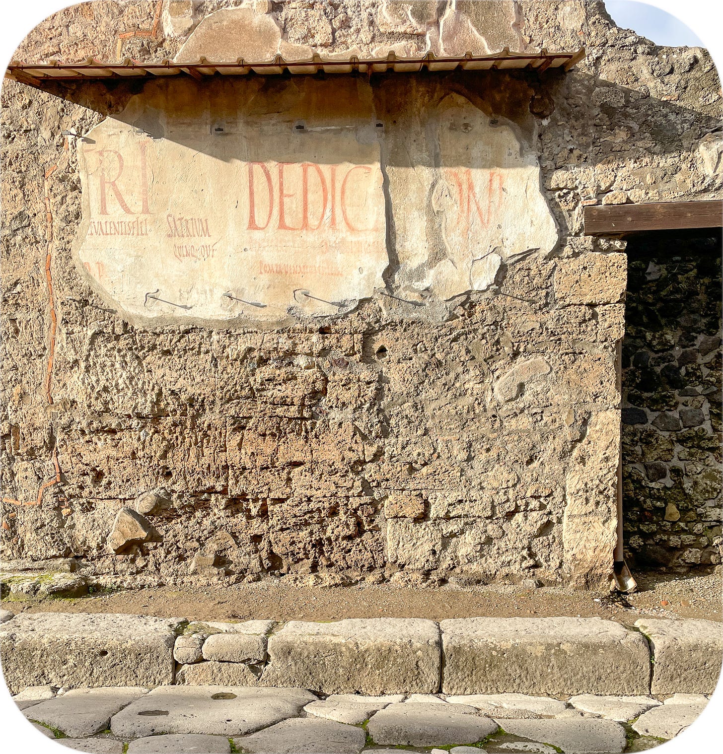 A political sign on the wall, Pompeii, Italy