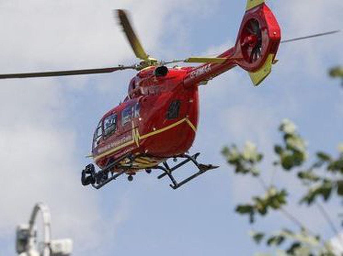 The air ambulance descending on the St Giles playing fields in Willenhall. Photo: Trevor Latham.