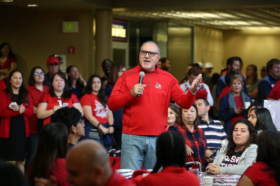 Frank Lamas speaks to employees and staff during a homecoming event at California State University, Fresno's student union in 2019.
