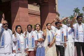 T-shirts with slogans delimitation row | T-shirt protest disrupts  Parliament, Speaker adjourns House amid delimitation row - Telegraph India