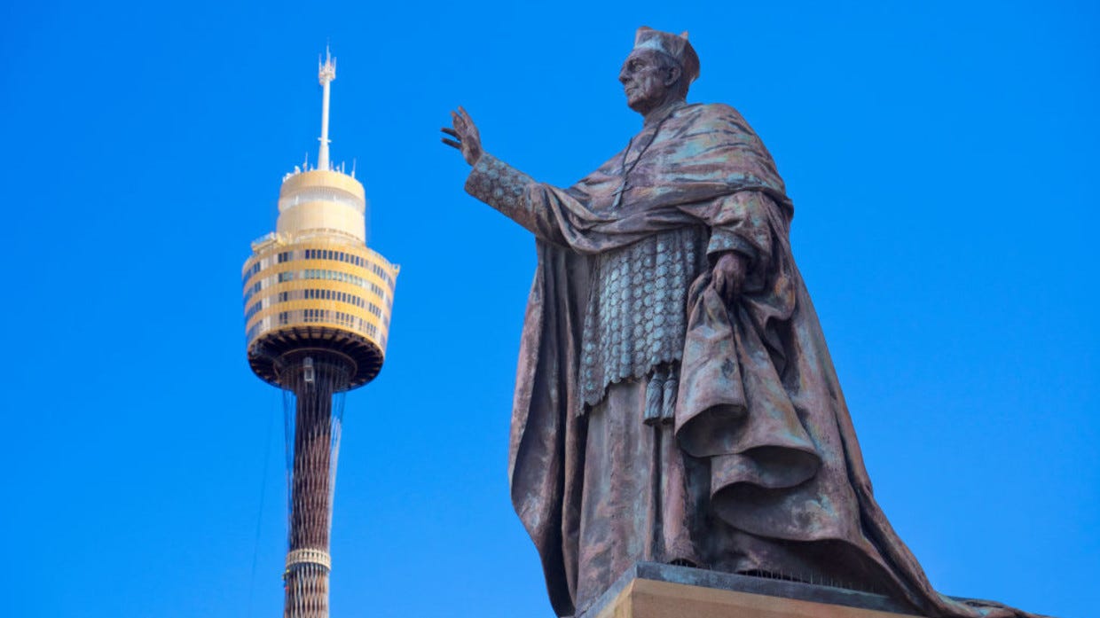 FILE PHOTO: Sydney Tower, Australia and Statue outside St Mary's Cathedral 1.