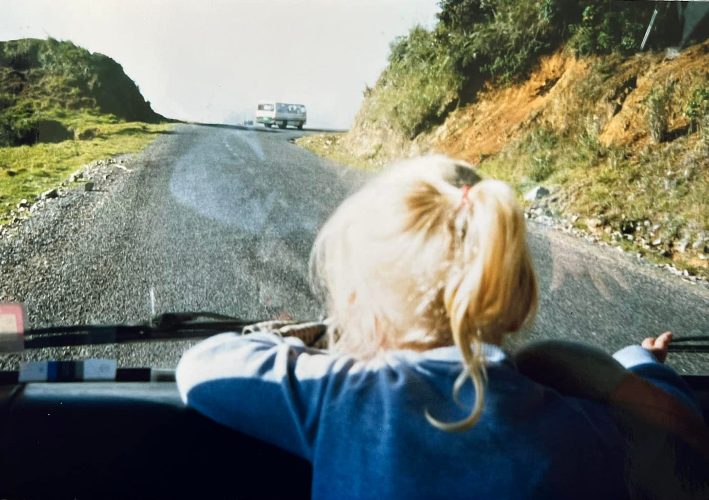 May be an image of 1 person, child and road