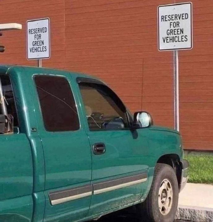 May be an image of car and text that says 'RESERVED FOR GREEN VEHICLES RESERVED FOR GREEN VEHICLES'
