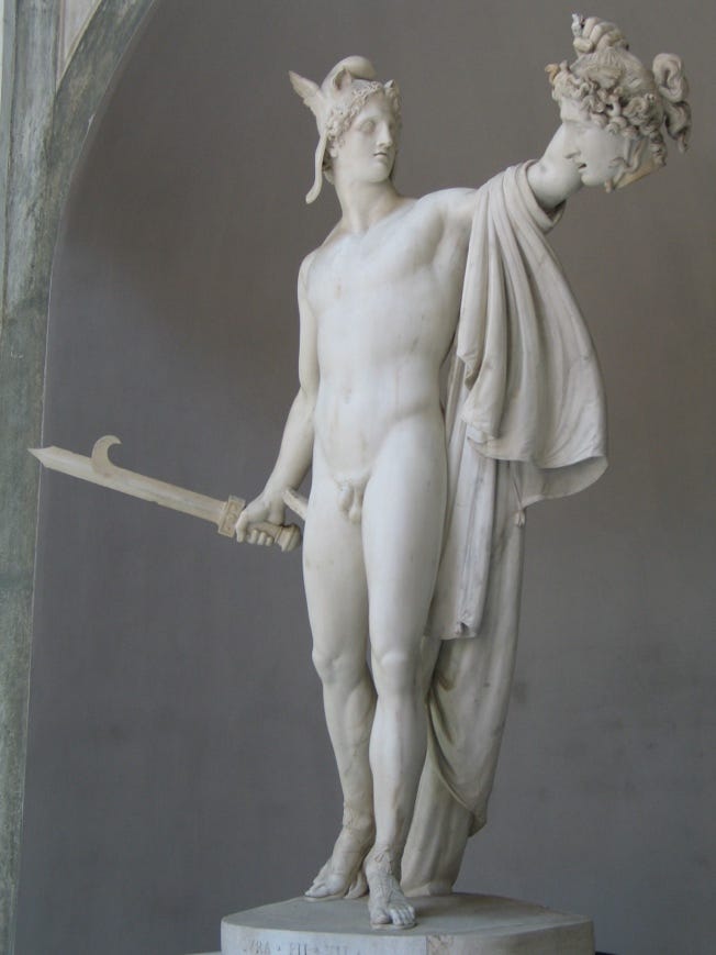 A statue of a person holding a sword

Description automatically generated