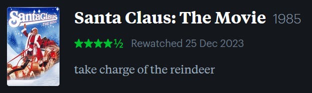 screenshot of LetterBoxd review of Santa Claus: The Movie, watched December 25, 2023: take charge of the reindeer