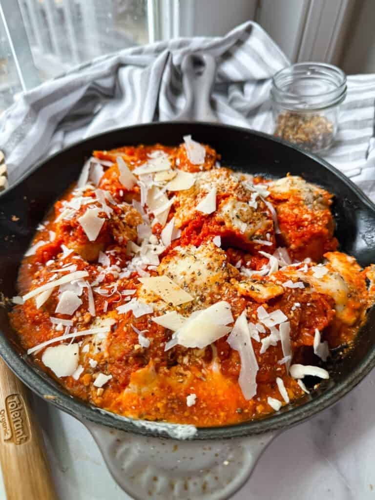 Baked Gluten Free Meatballs in a Skillet pan.