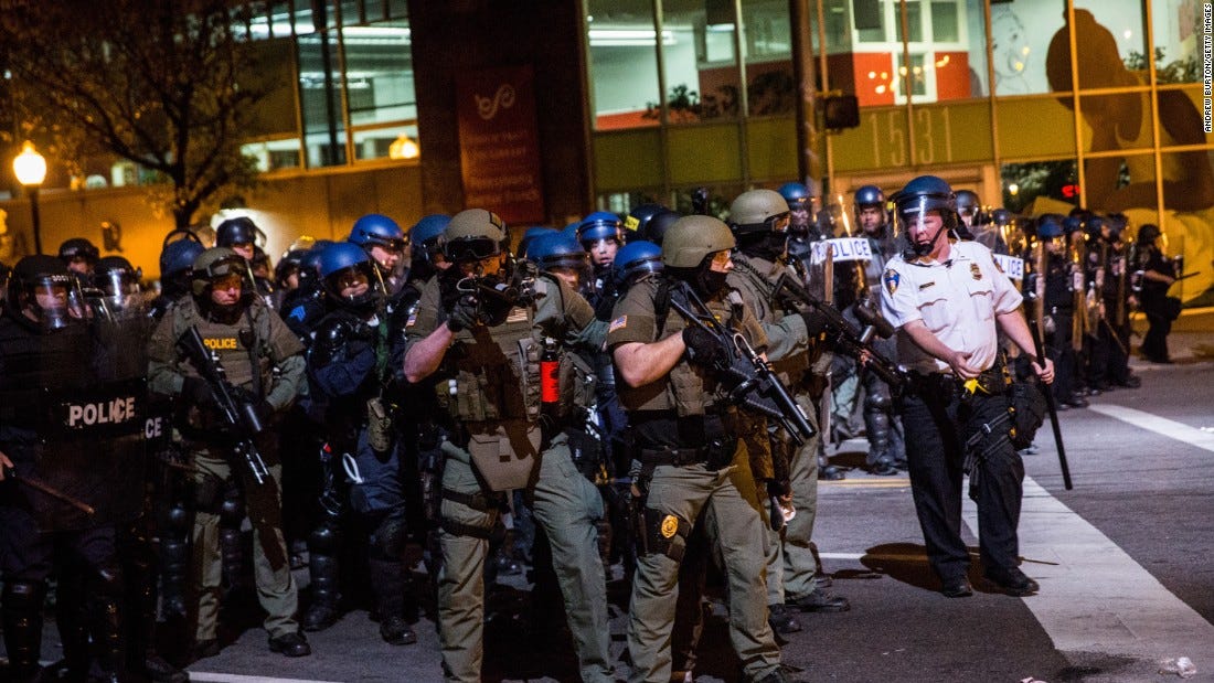 Baltimore protests: Crowds stand firm after curfew - CNN