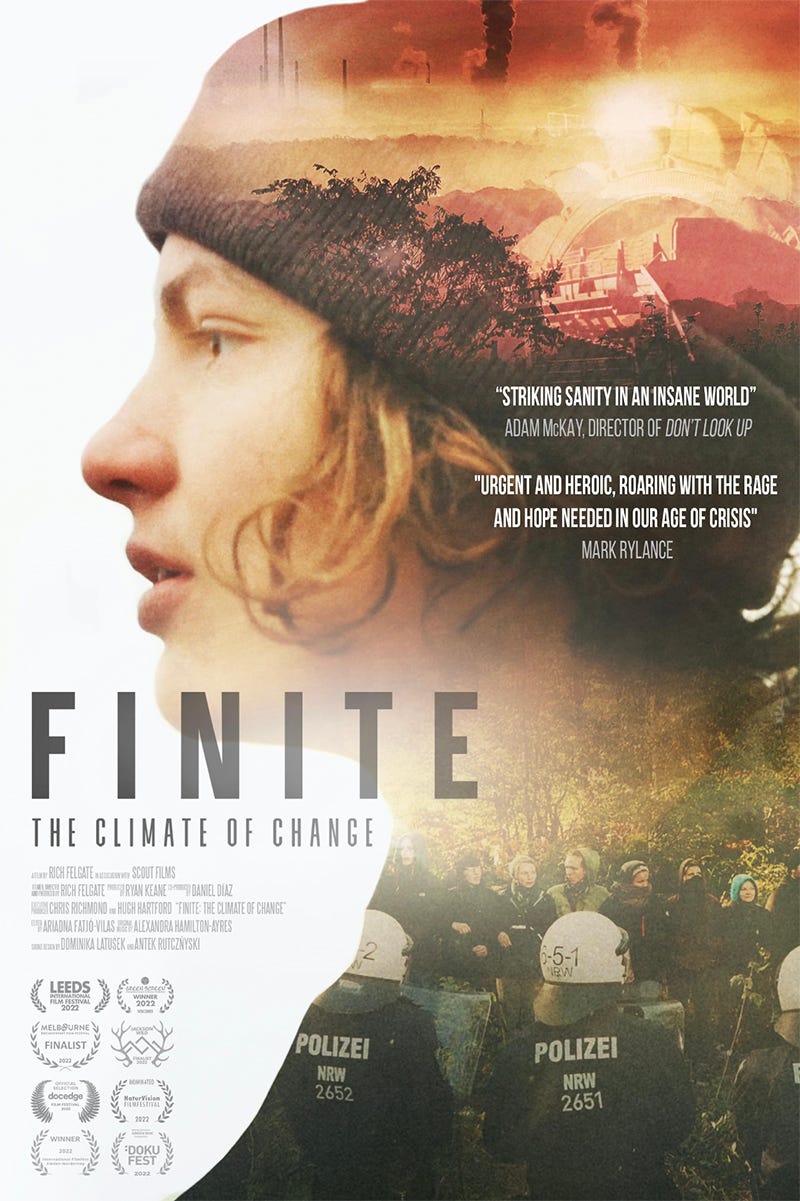 Cover of the documentary "Finite." Image of a man with smokestacks and nature in the background
