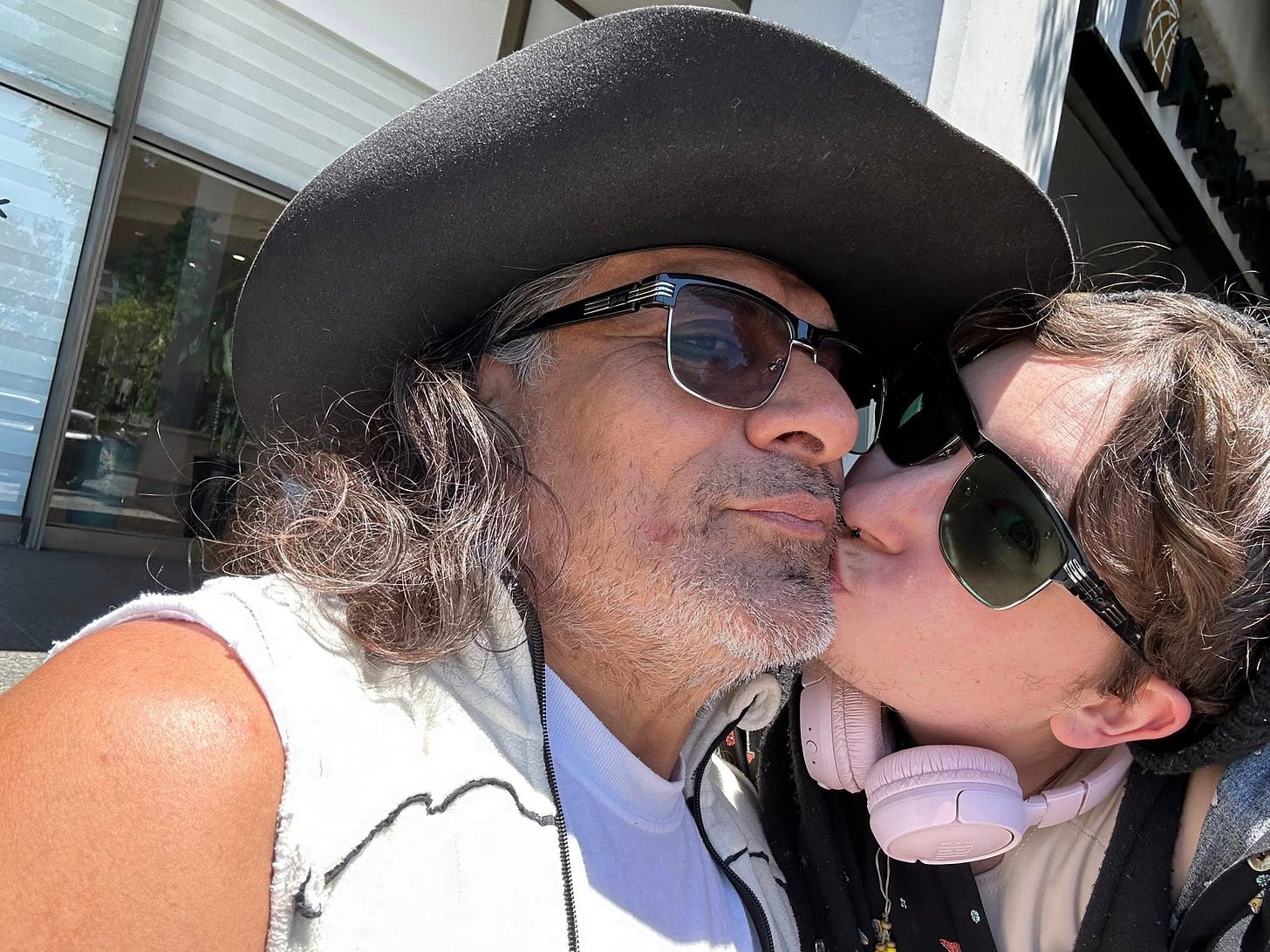 May be an image of 2 people, hat and eyewear