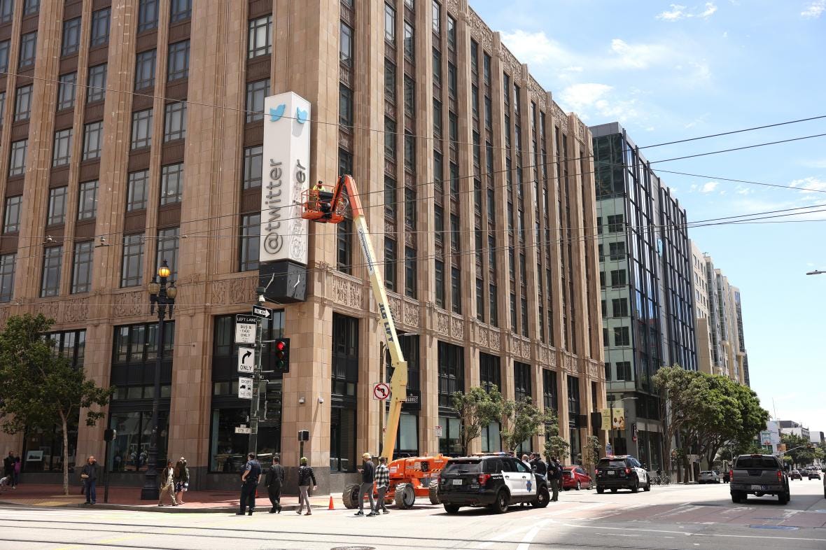 The Twitter logo comes down in San Francisco in July