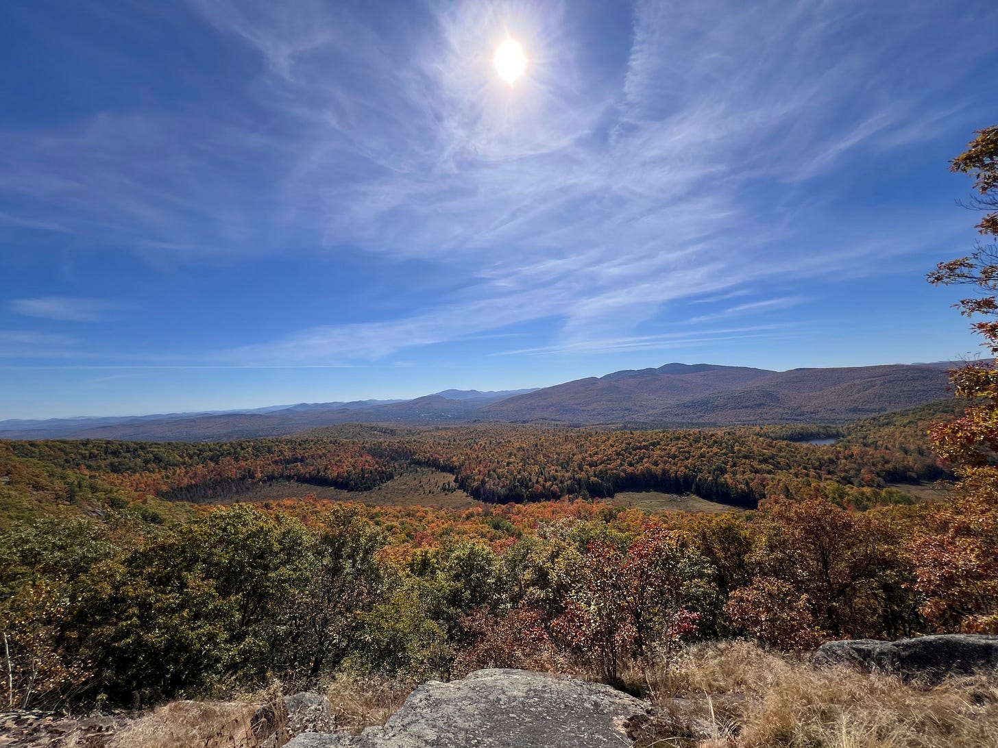 sun over fall mountains-Moxham Mountain in Adirondacks