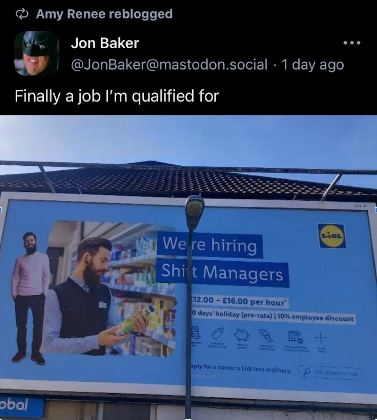 Billboard with a light post in front of it. Key phrase says "We're hiring shift managers" but the F is blocked by the post.