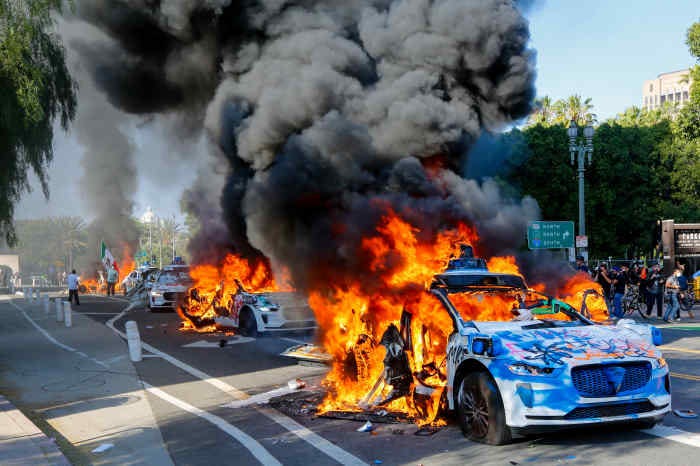 Why Protestors Are Burning Waymo Self-Driving Cars in Los Angeles Protests  - Barron's
